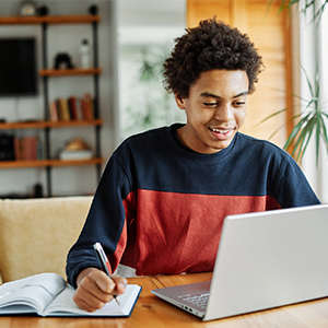 A student using a laptop