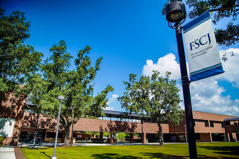 Outside campus with FSCJ Banner