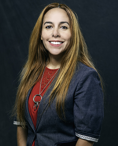 Jennifer Sanchez Jennifer Sanchez in red top on black background