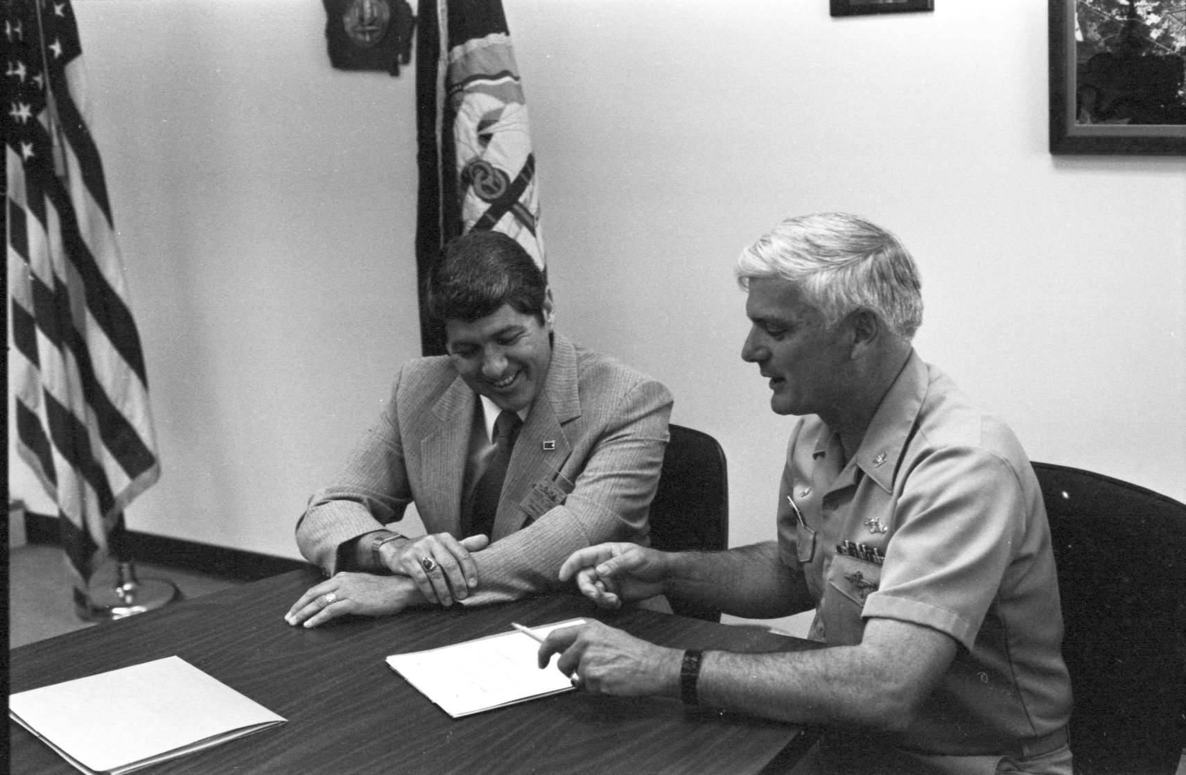 Spence and O'Beirne Looking Over a Document