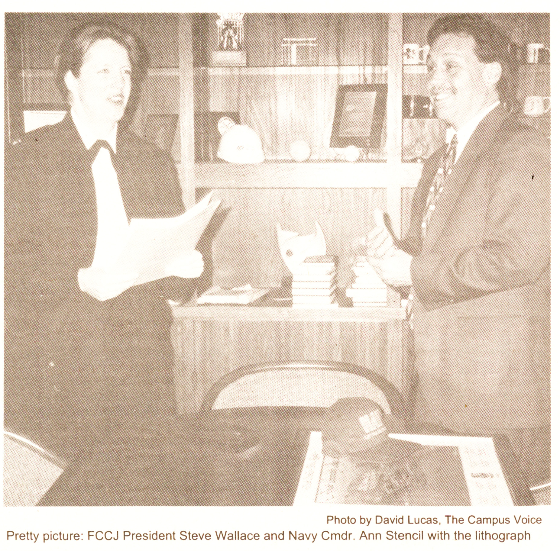 Article Featuring the Navy Program; image of President Steve Wallace being gifted lithographic in appreciation of creating program