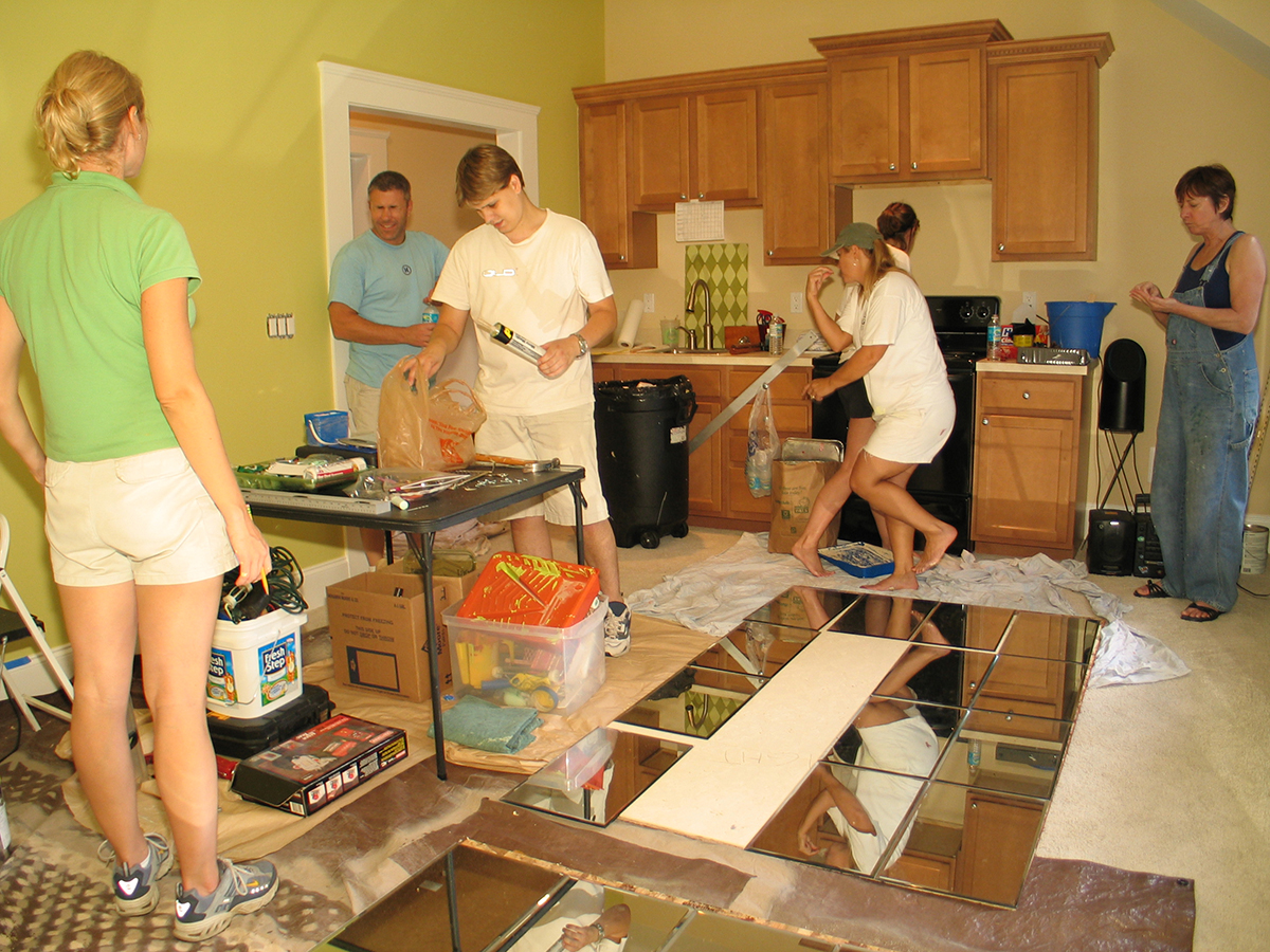 Interior design students working on decorating the Ellis garage apartment.