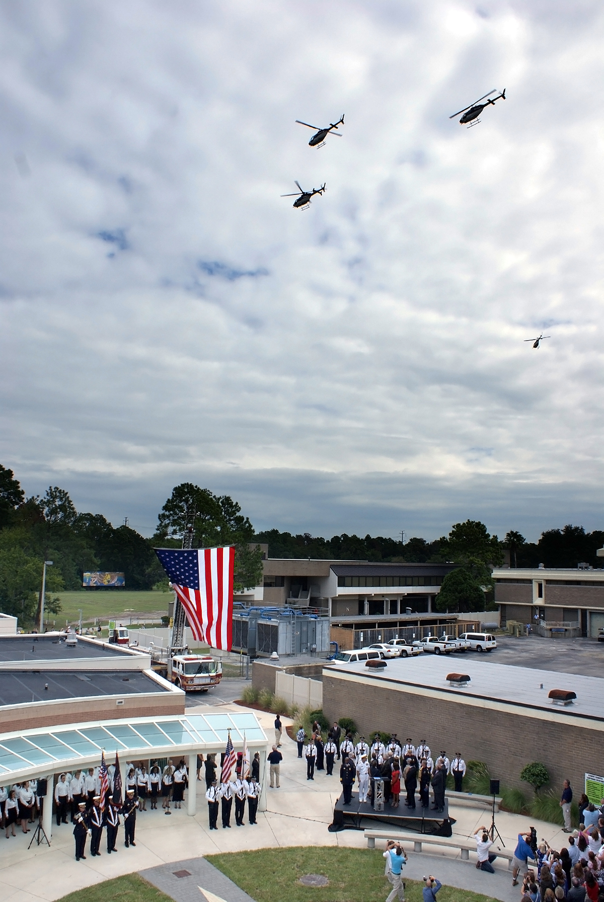 Photo of 9/11 memorial service to reveal new South sculpture.