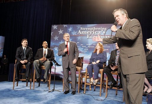 """Photo of College President Steve Wallace, student Eric Mitchell, and President George W. Bush"""