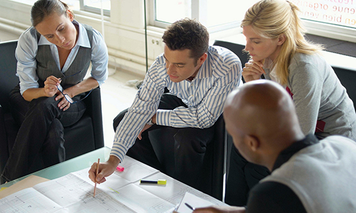 A diverse group of people in an office setting