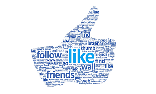 A word cloud in the shape of a thumbs up "like" icon