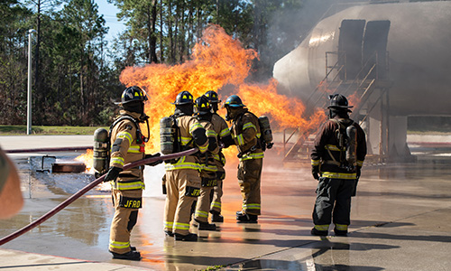 Firefighters fighting an aircraft fire