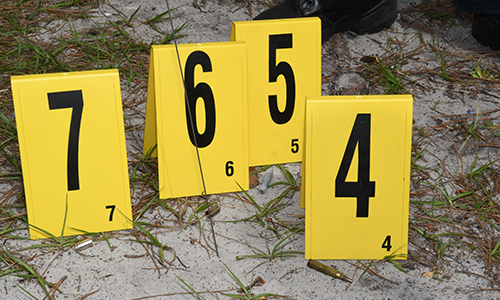 Evidence number tents on the ground