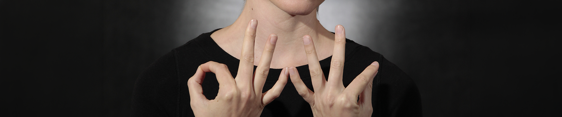 A person doing sign language