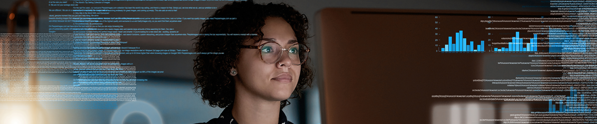 A woman using a computer with various graphical overlays