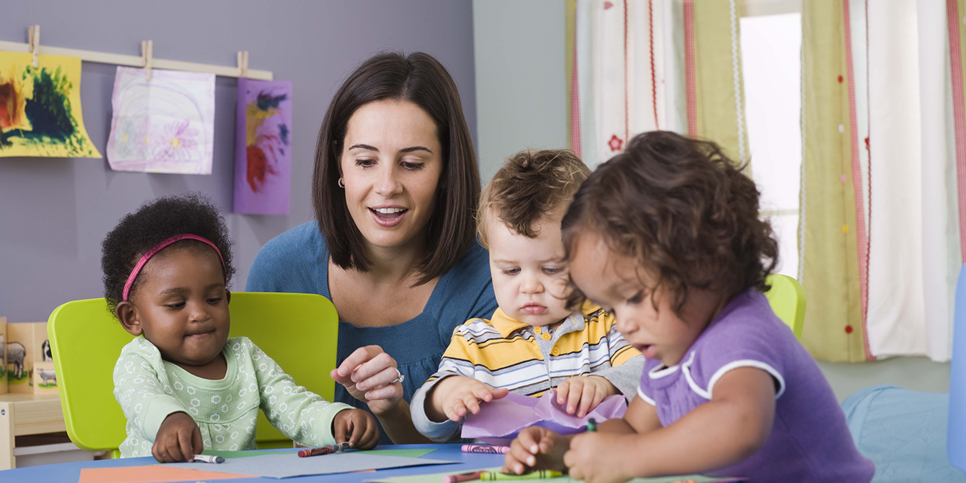 A woman in a child care setting