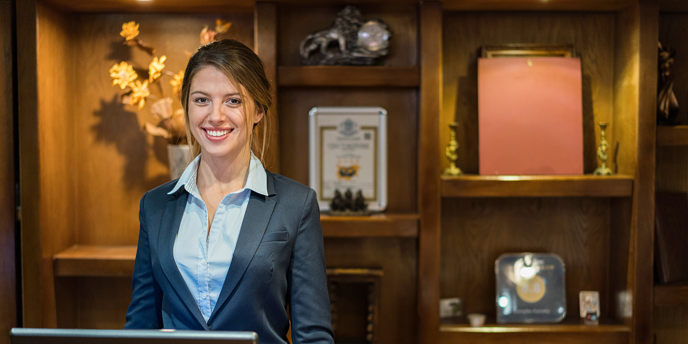 A woman in a hospitality setting