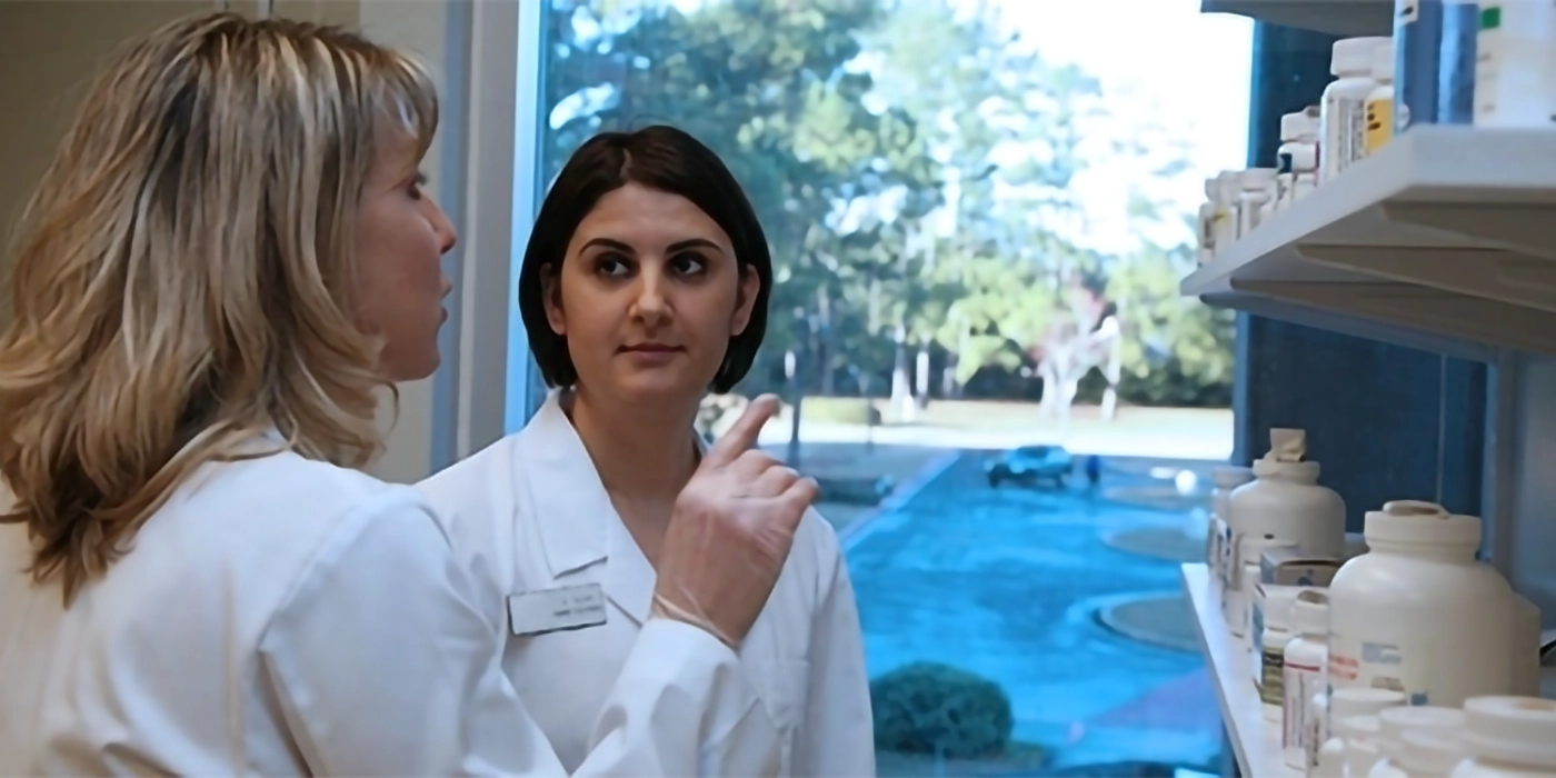 People in a pharmacy setting