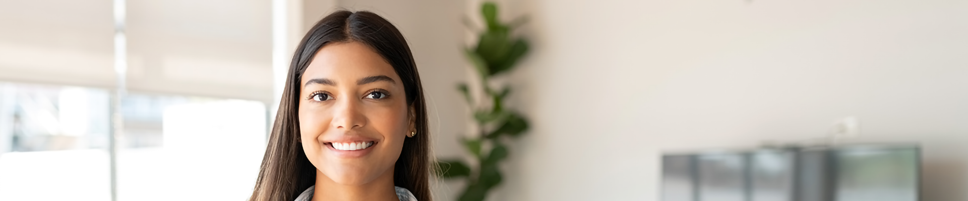 A young woman in an office setting