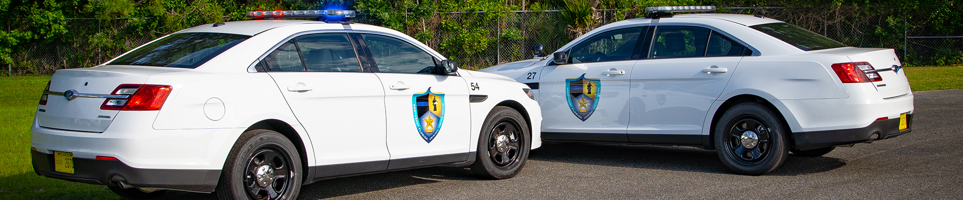 Three people in police uniforms