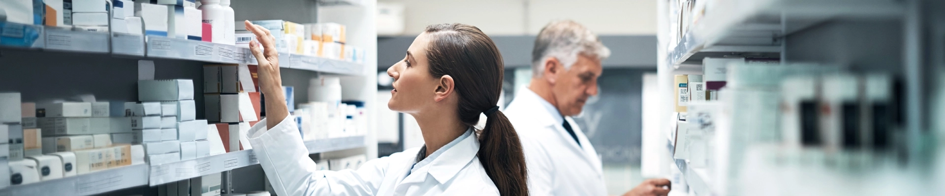 People in a pharmacy setting
