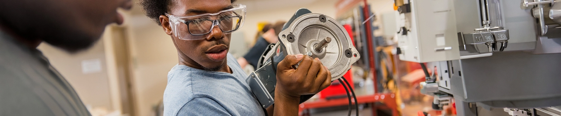 A man working on industrial machinery