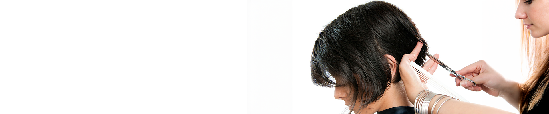 A barber cutting a person's hair