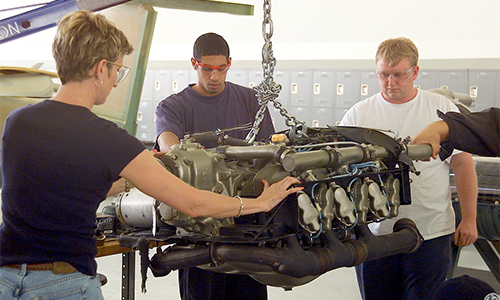 People working on aircraft