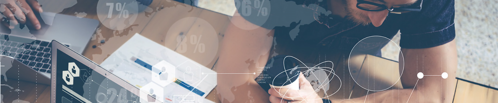 People working on laptops and tablets with various graphical overlays