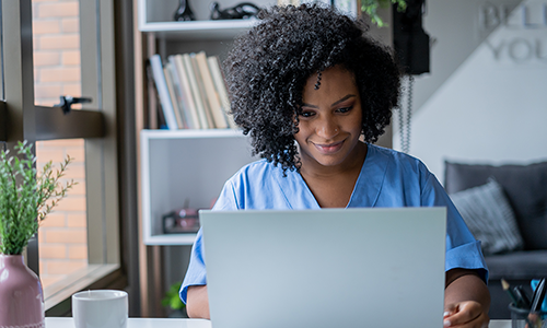 A woman using a laptop