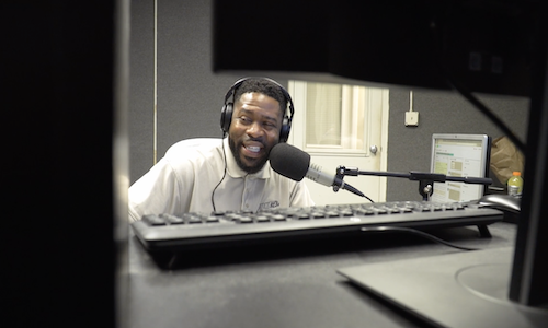 Man behind microphone