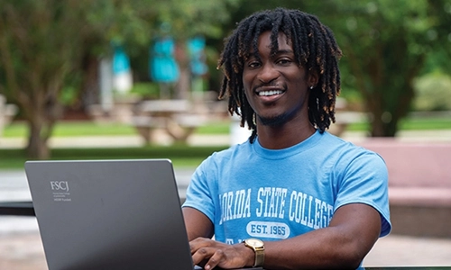 A man using a laptop