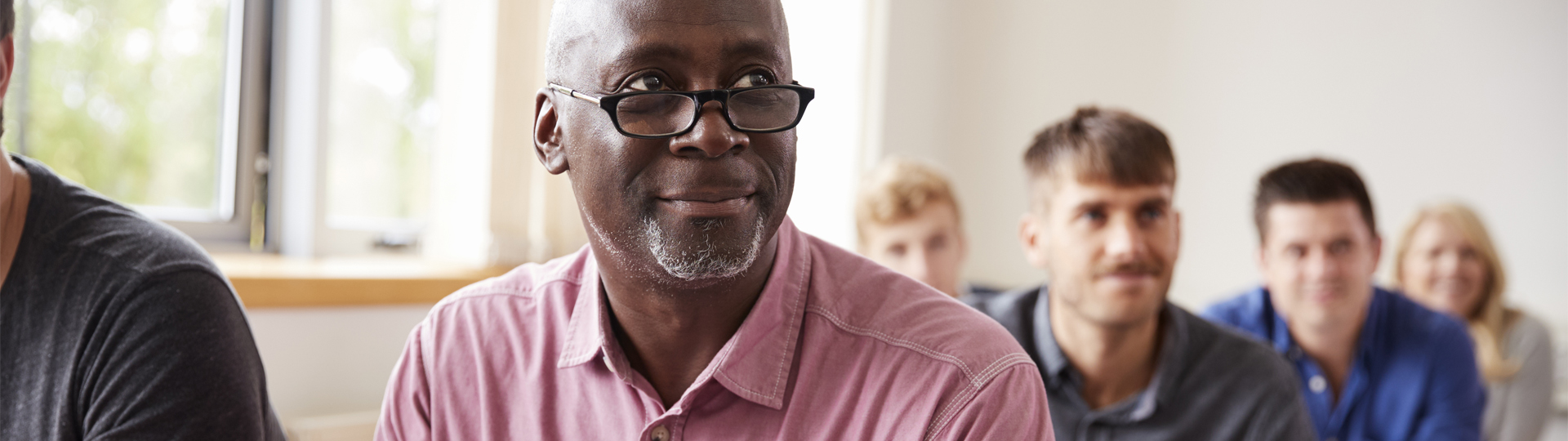 A diverse group of middle aged students