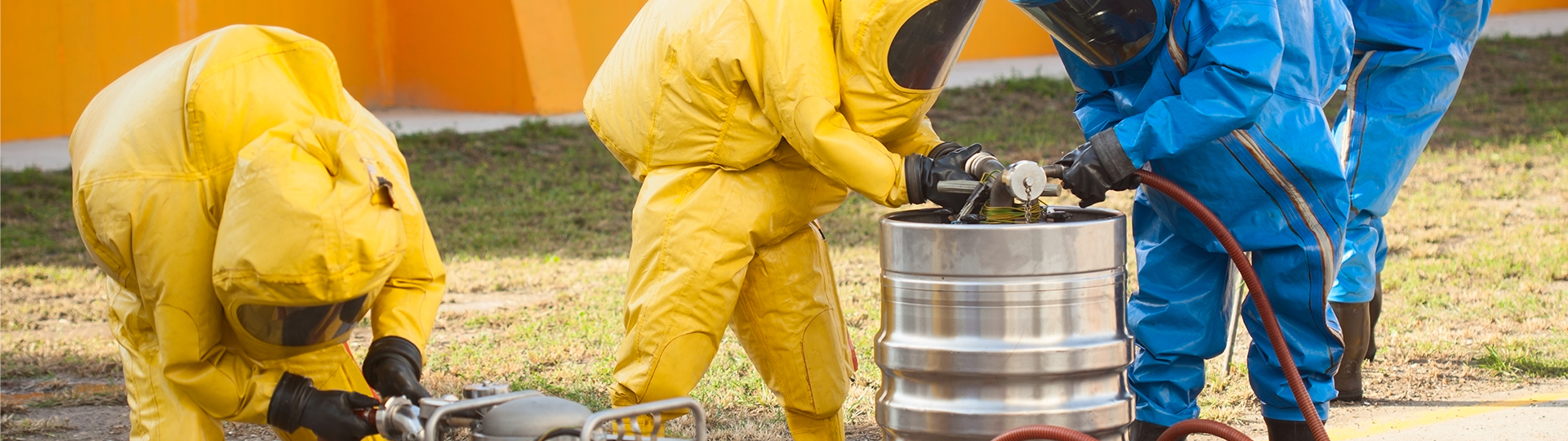 People in full hazmat suits